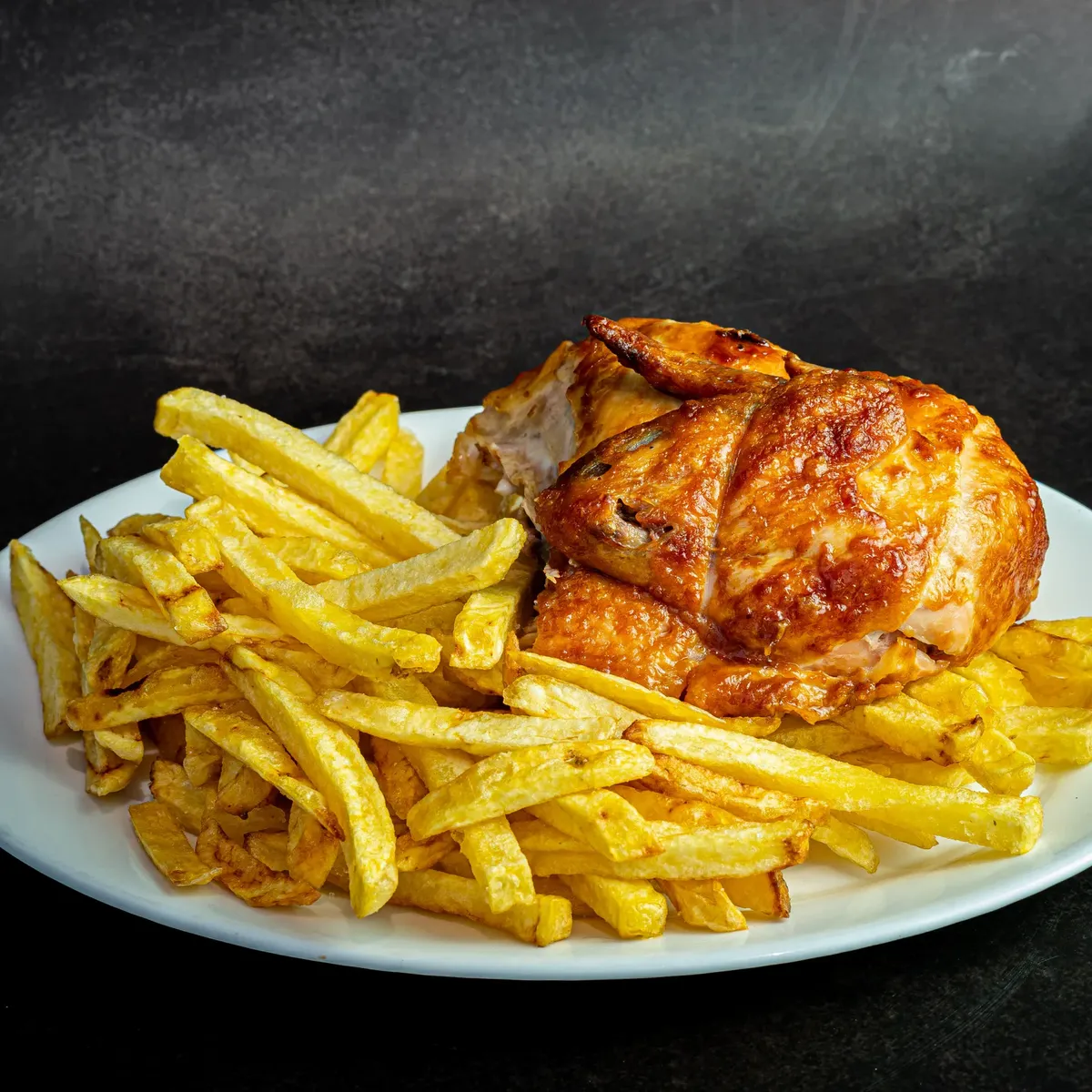POLLO ASADO CON PAPAS A LA FRANCESA